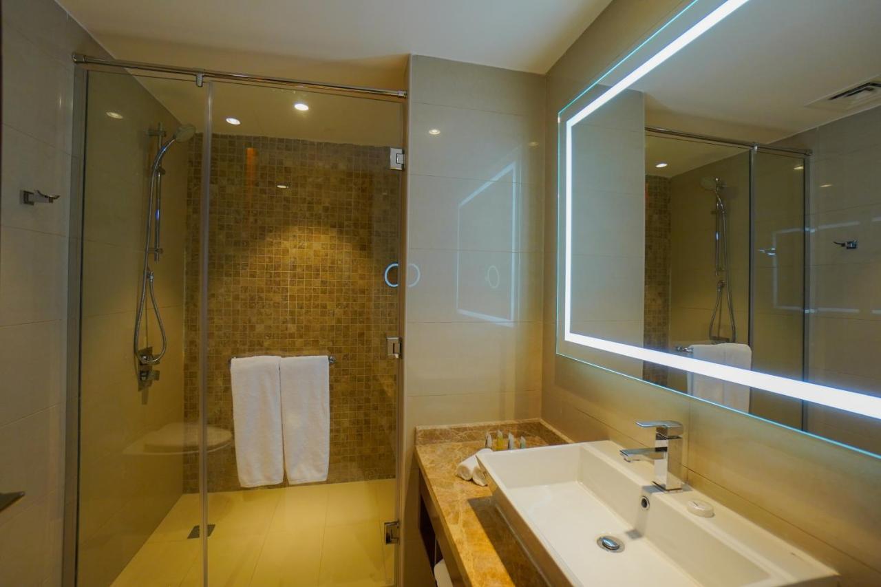 The Grand Lux Hotel Doha Exterior photo Bathroom