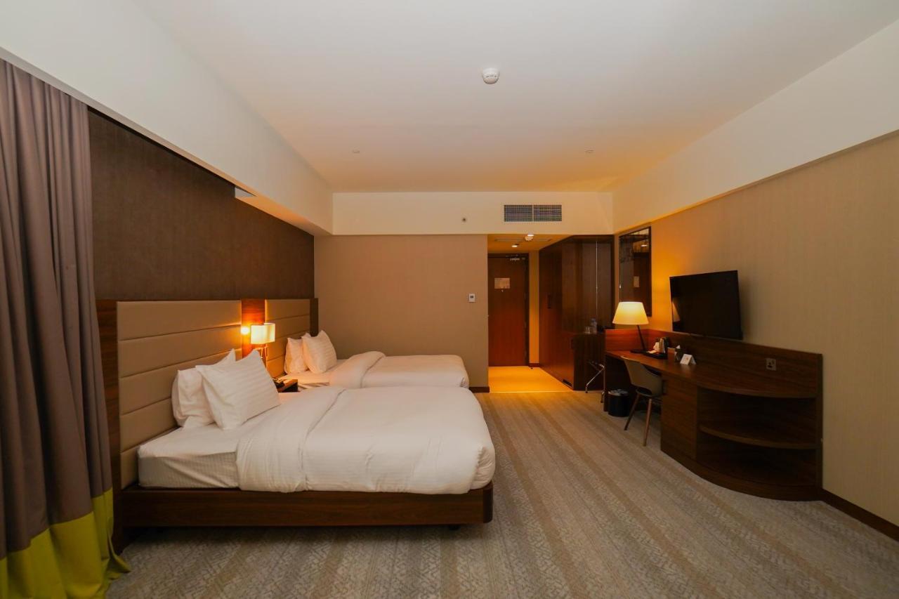 The Grand Lux Hotel Doha Exterior photo Deluxe room