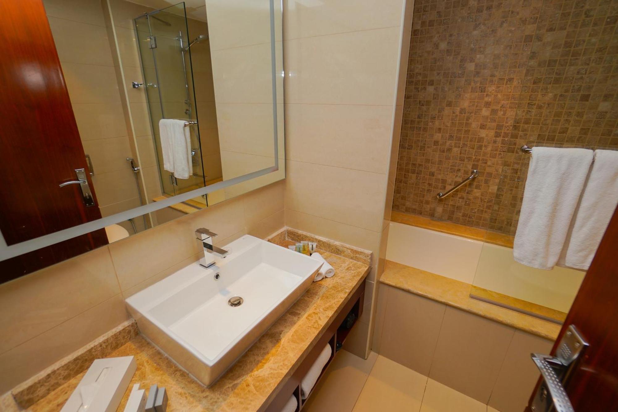 The Grand Lux Hotel Doha Exterior photo Bathroom