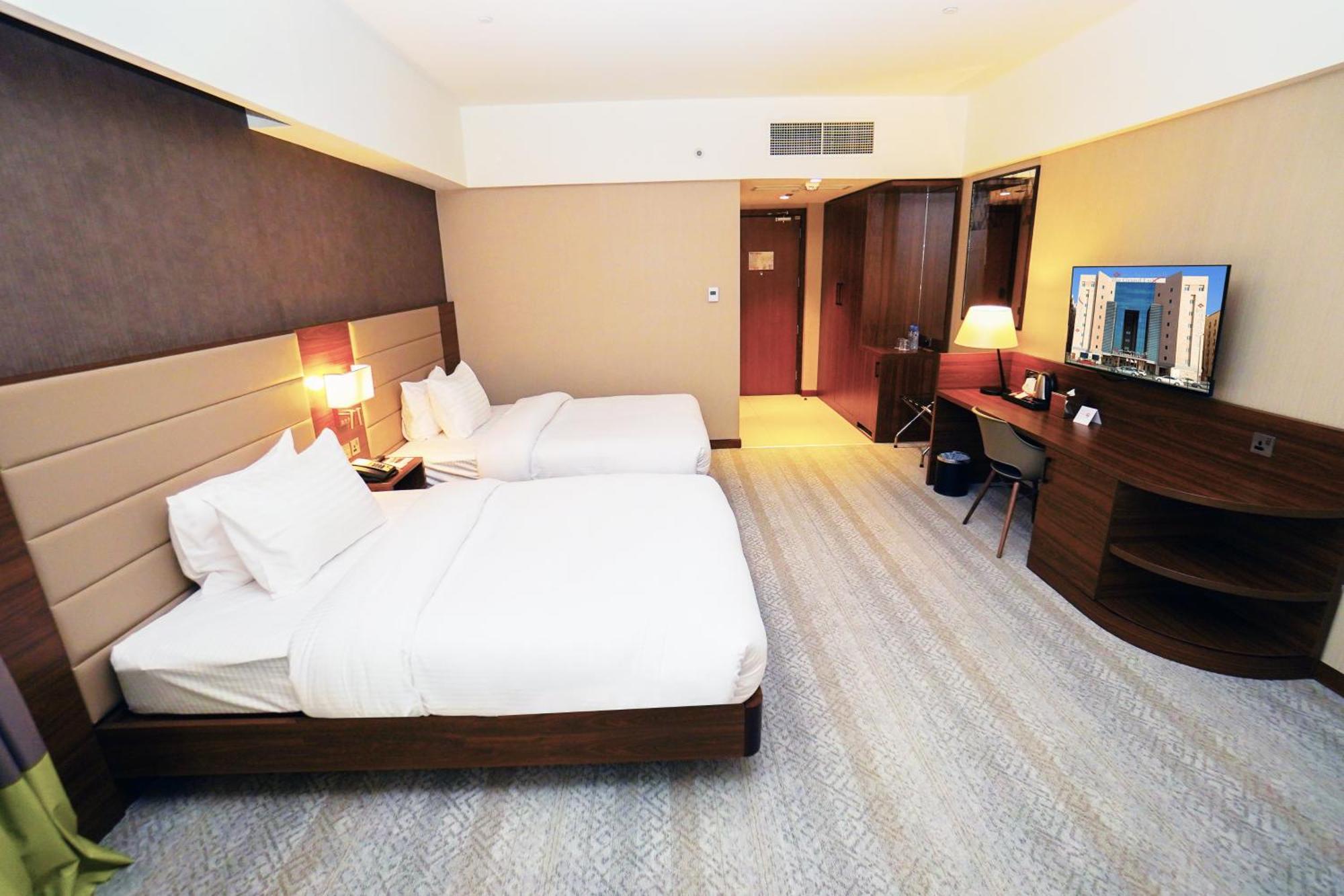 The Grand Lux Hotel Doha Exterior photo Deluxe Room